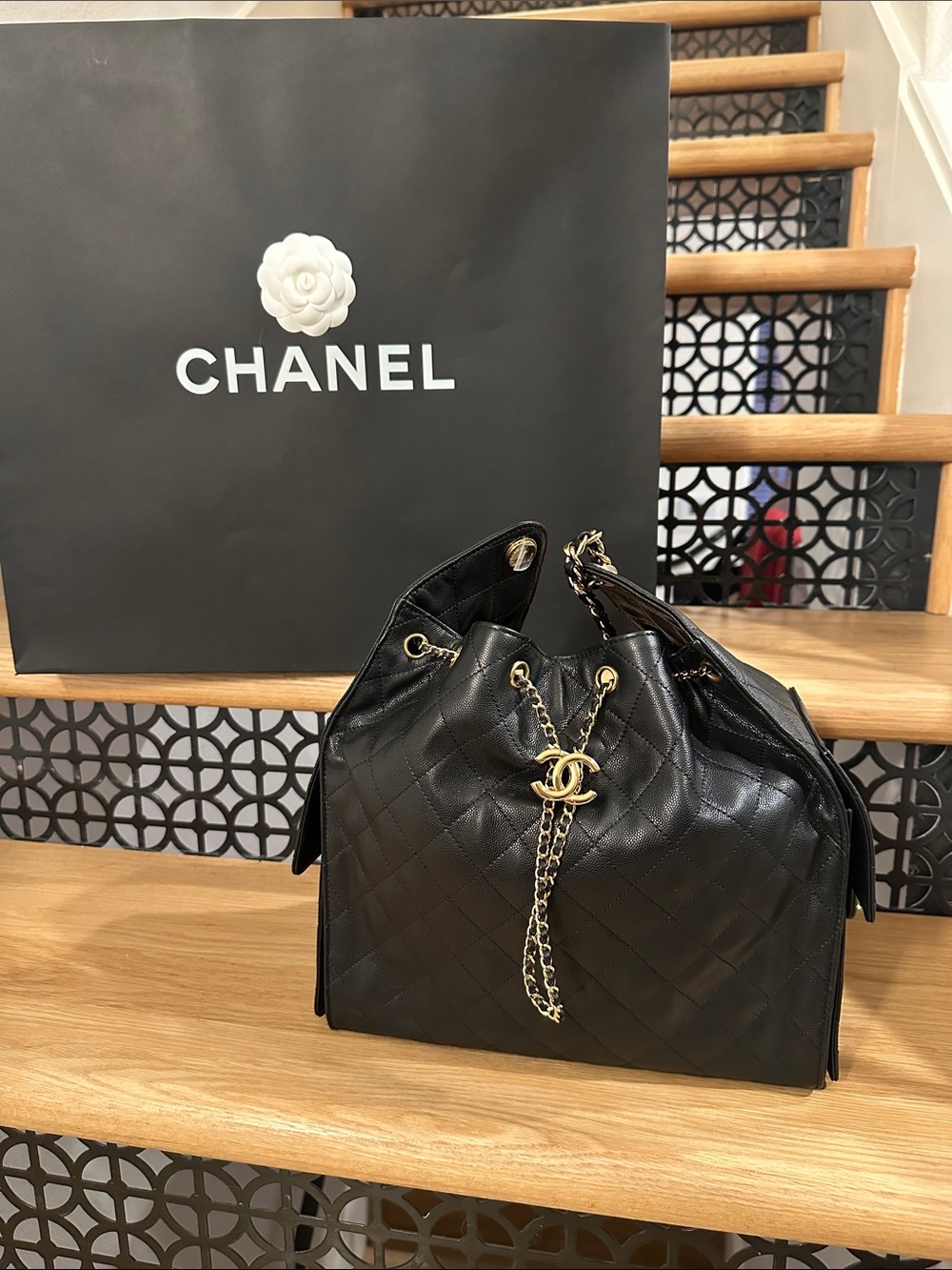 Chanel 25 Black Caviar Quilted Drawstring Shoulder Bag